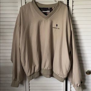 Tan windbreaker with flannel on the inside